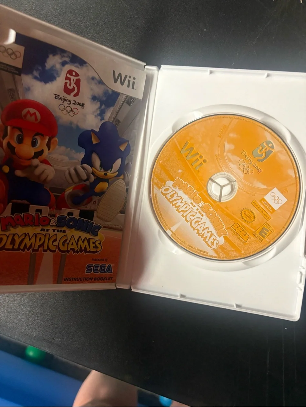 9 total Stack of Nintendo Wii Games with Cases - Assorted Titles